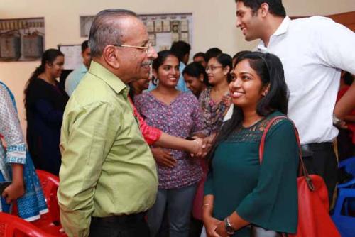 Diana having tete-a-tete with Justice Rtd. M R Hariharan  Nair