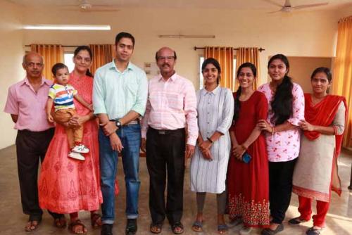 Anand Parathara and family with Dr CRK Nair and students